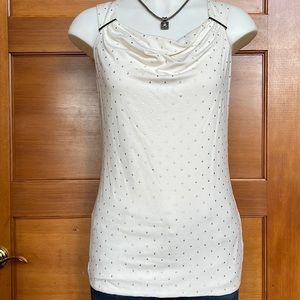 White House Black Market Sleeveless shirt with silver metallic design.